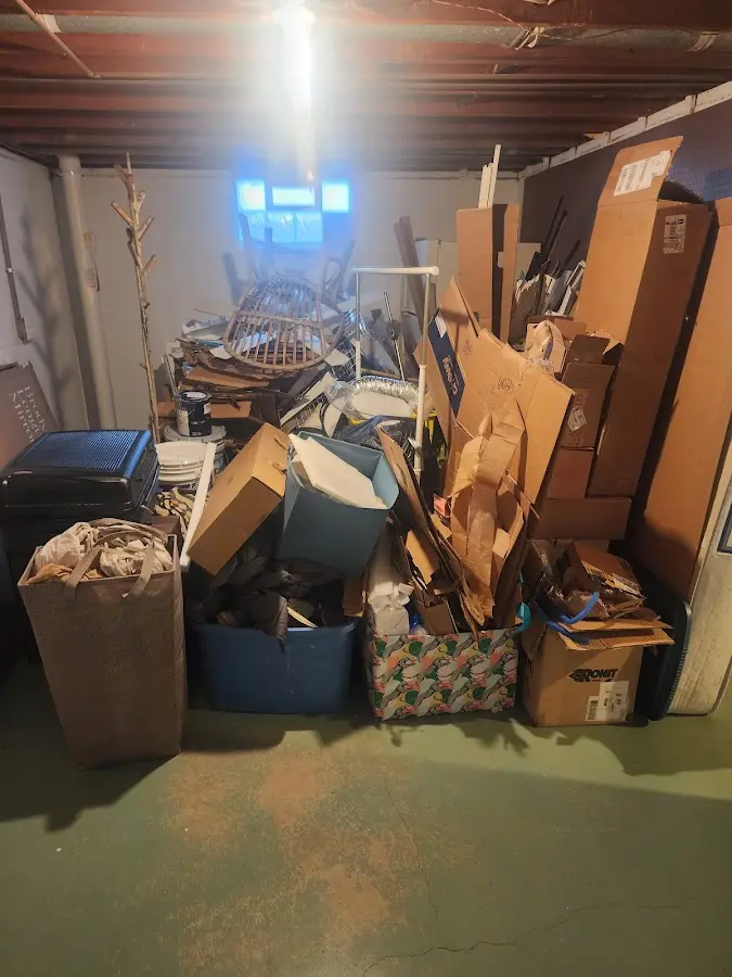 Roll-off dumpster container at job site for 4 Yard Dumpster Rental in Layton